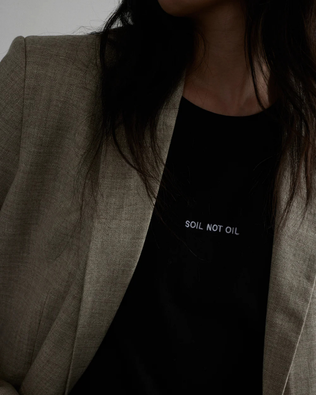 Adria 'Soil Not Oil' T-Shirt in Black by AKYN