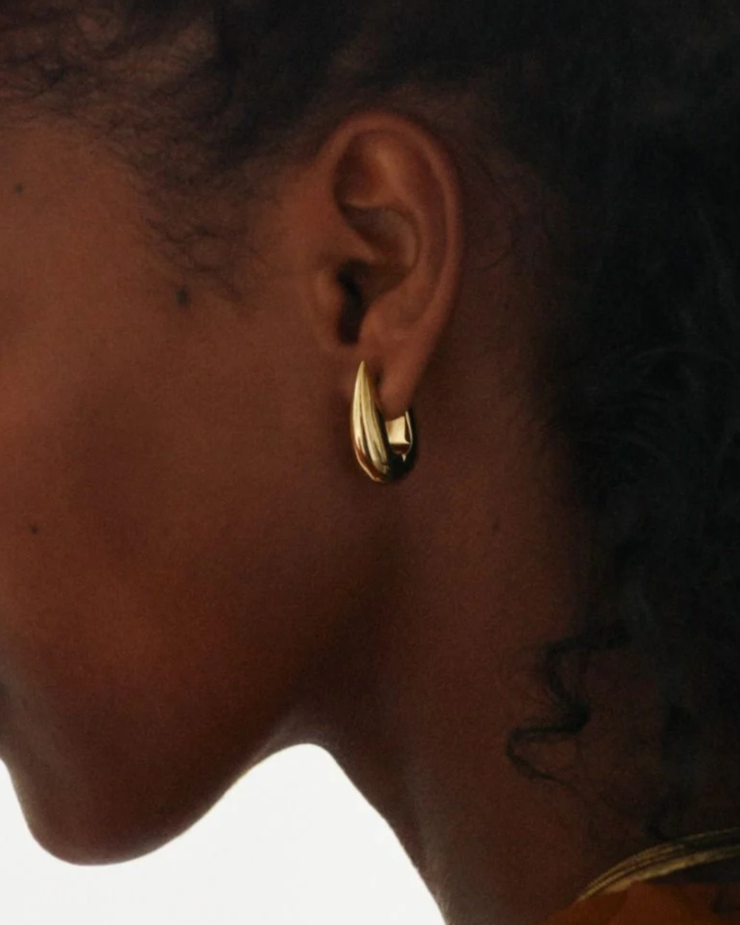 Crest Hoops in Gold by EDBLAD